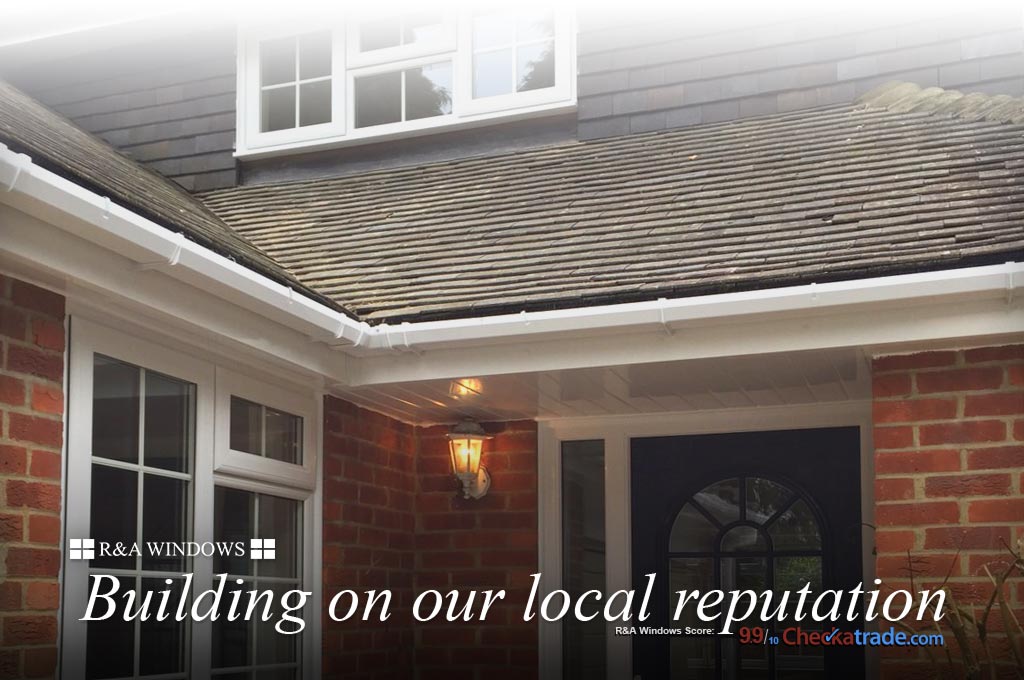 White fascias, bargeboards, soffits and guttering installed on English house