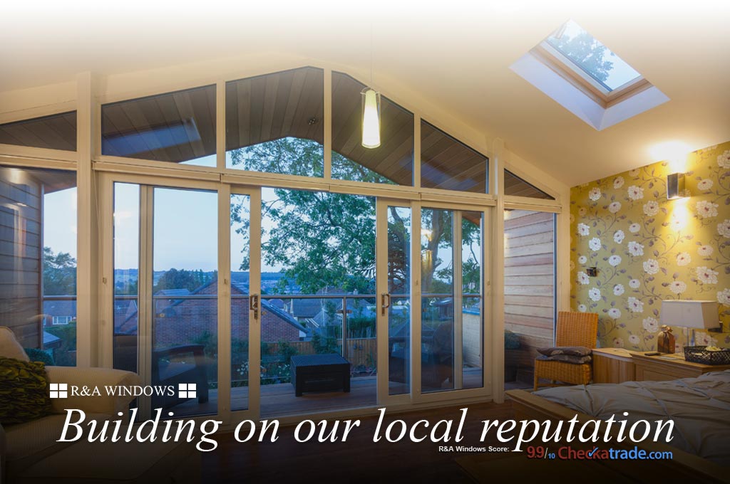 Double glazed sliding patio doors view from inside with a happy couple sitting enjoying a cup of coffee